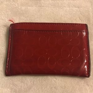 Red leather coach card wallet